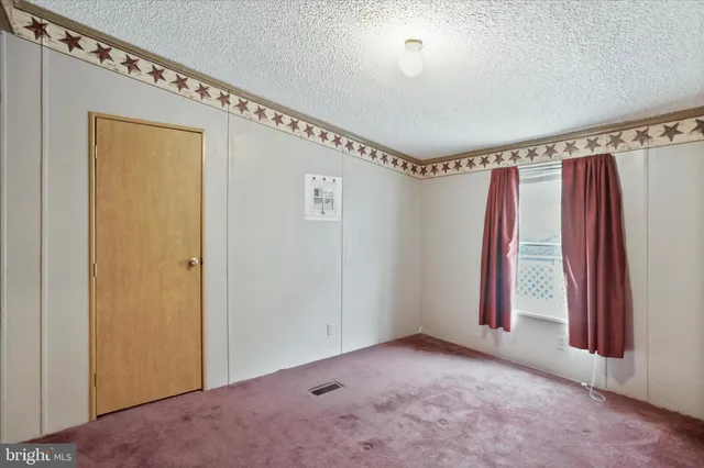 a view of a room with an empty space