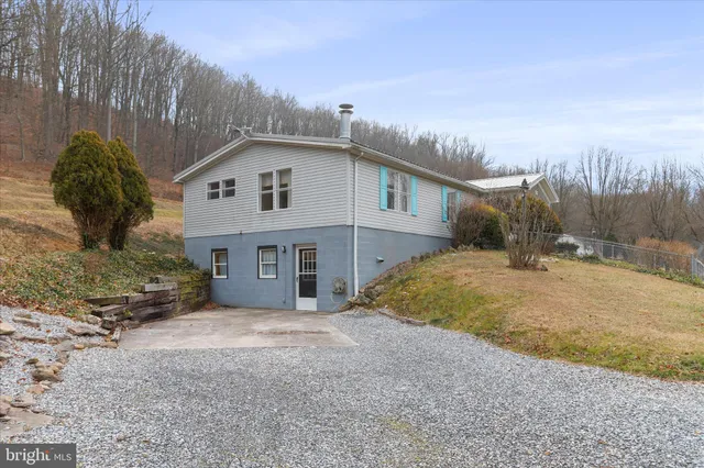 a view of mountain view with lots of trees