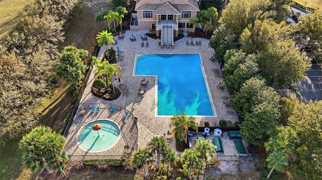 5047 Rishley Run Way Mount Dora, FL 32757 - Photo 41 of 42 an aerial view of a house with garden space and outdoor seating