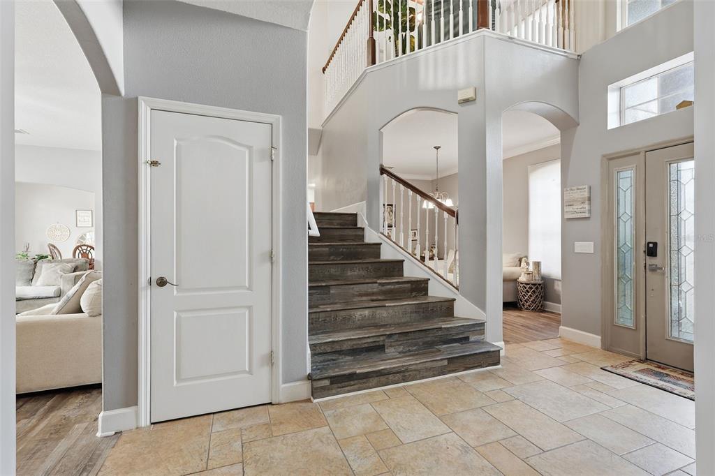 5047 Rishley Run Way Mount Dora, FL 32757 - Photo 5 of 42 a view of entryway and hall with a window