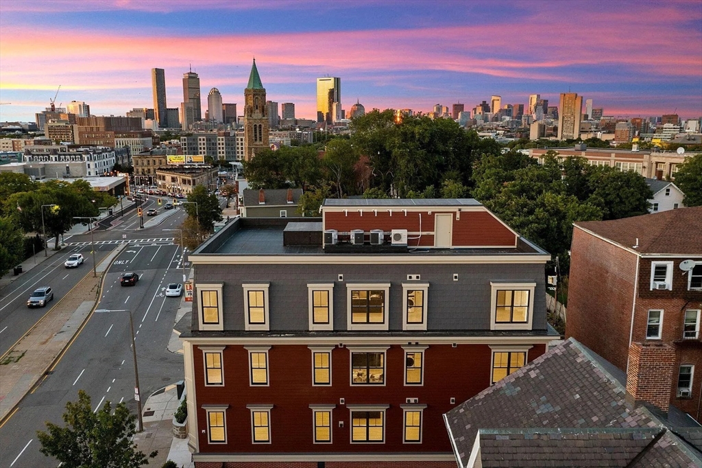 124 Warren Street, Unit 302 Boston, MA 02119 - Photo 24 of 24 a front view of a multi story building