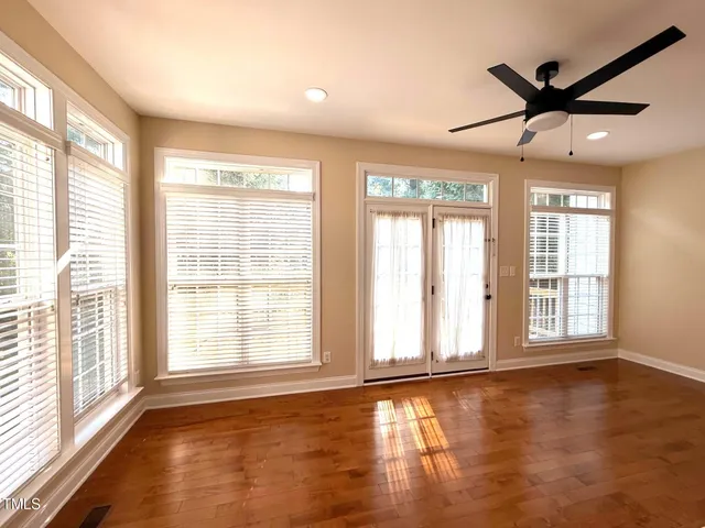 a kitchen with stainless steel appliances granite countertop a stove a microwave and a sink