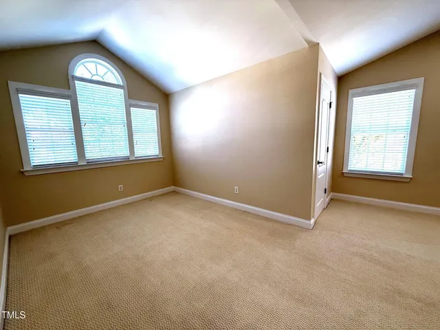 a bathroom with a sink double vanity granite tub and shower