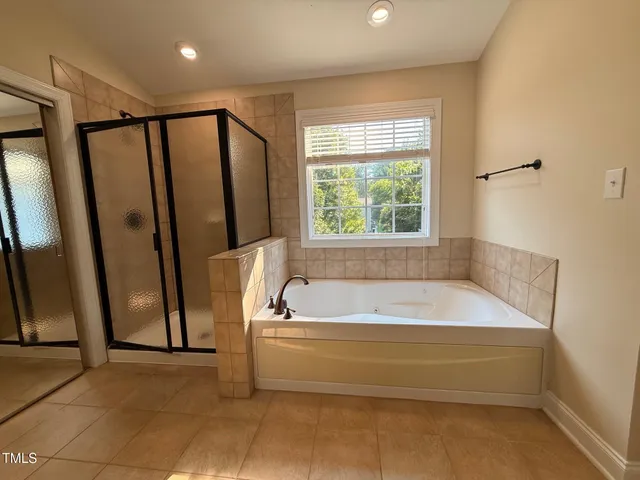 a view of a hallway with windows