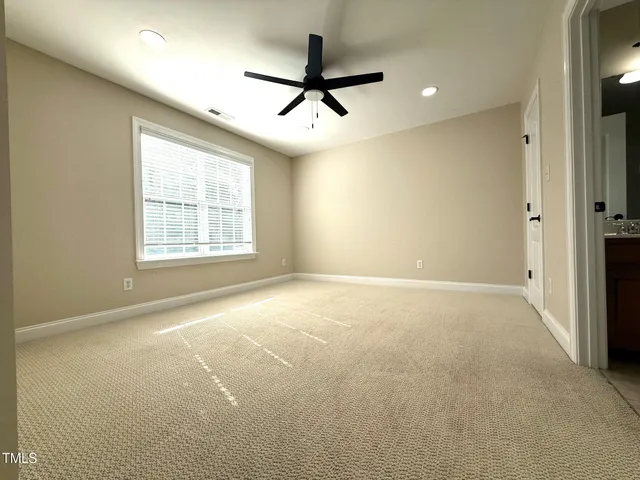 a bathroom with a sink mirror vanity and bathtub
