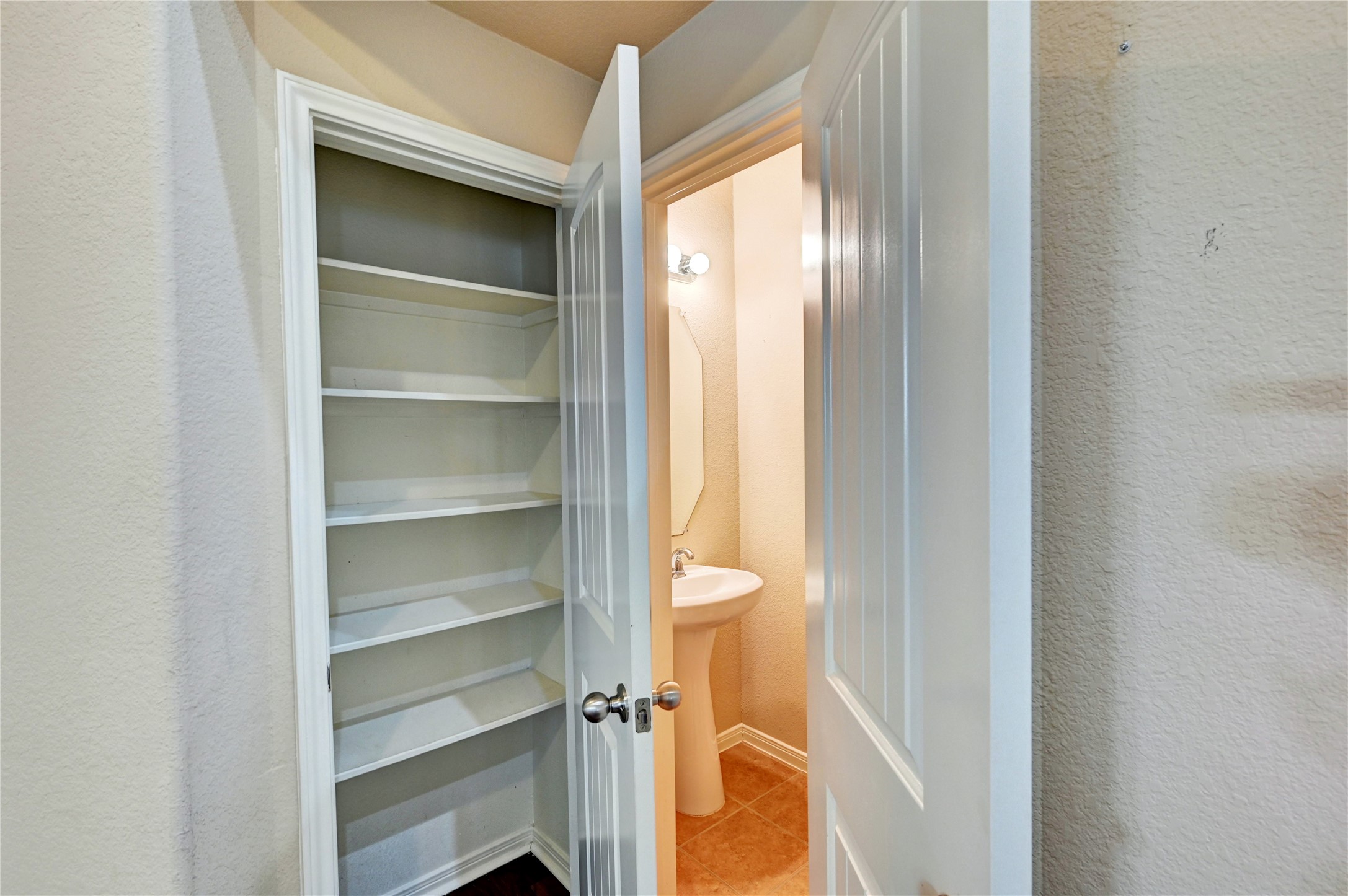 2619 Colony Haven Circle Spring, TX 77373 - Photo 14 of 50 a view of walk in closet with empty racks