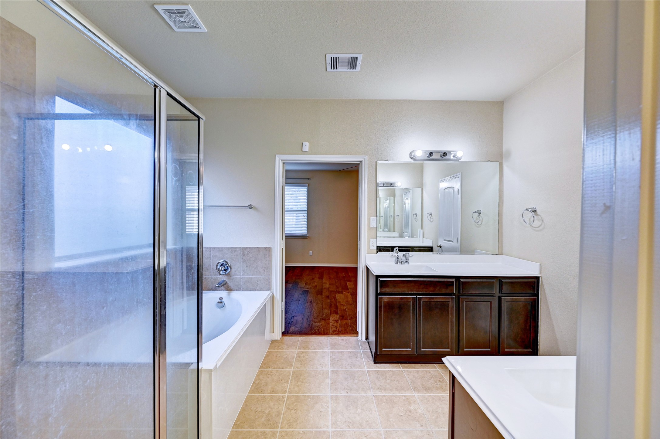 2619 Colony Haven Circle Spring, TX 77373 - Photo 37 of 50 a bathroom with a tub sink shower and mirror