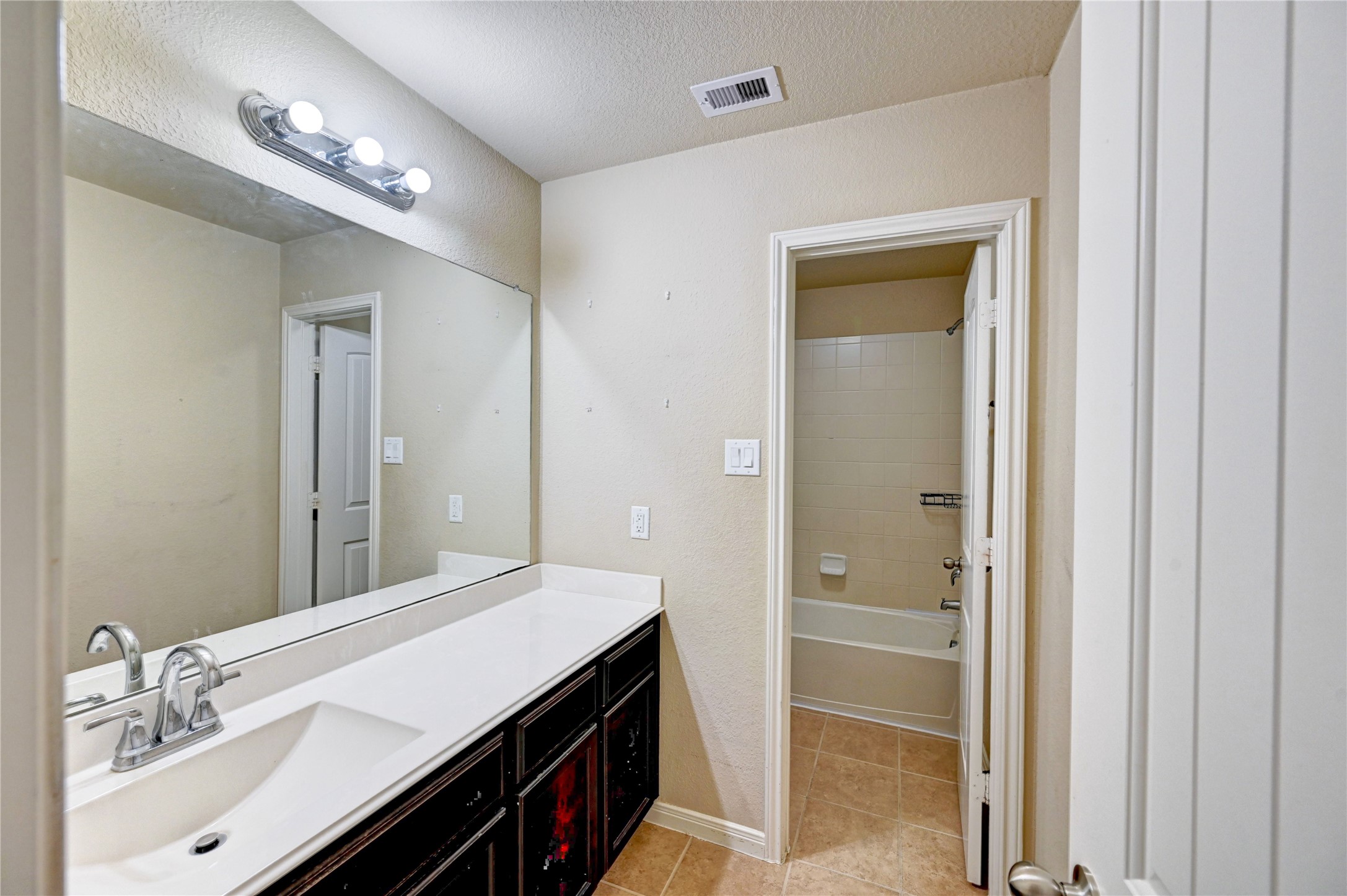 2619 Colony Haven Circle Spring, TX 77373 - Photo 40 of 50 a bathroom with a sink a vanity and a mirror