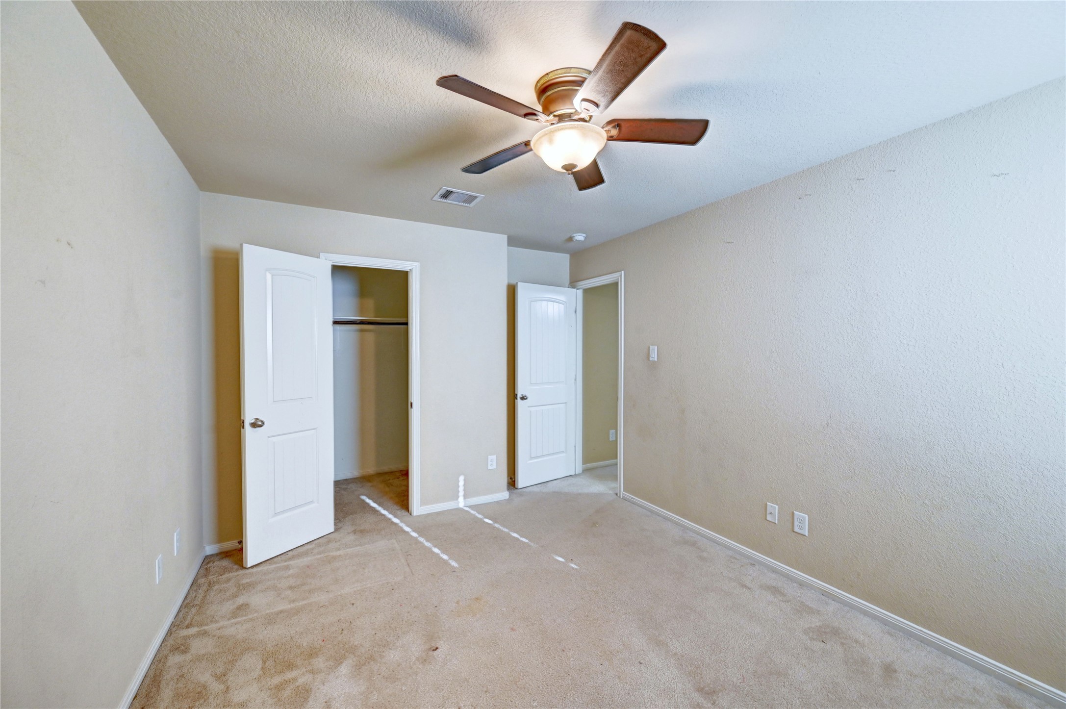 2619 Colony Haven Circle Spring, TX 77373 - Photo 42 of 50 an empty room with closet and fan