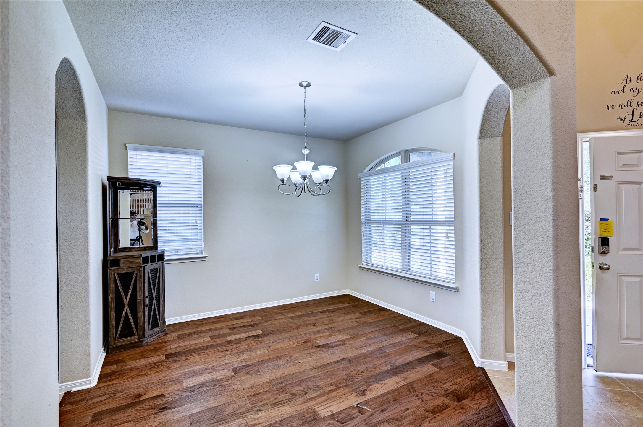 2619 Colony Haven Circle Spring, TX 77373 - Photo 9 of 50 a view of a bedroom with wooden floor and windows