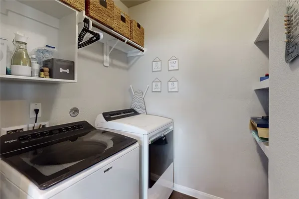 a kitchen with a stove and a microwave