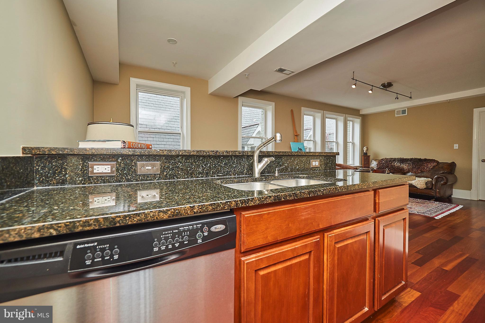 1465 Columbia Road Northwest, Unit 302 Washington, DC 20009 - Photo 12 of 30 Graninte counter top and stainless steel appliance