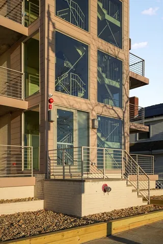 a view of a brick house with a window
