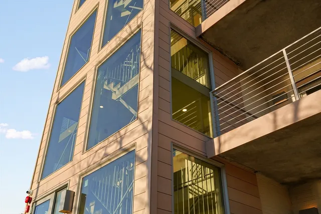 a view of a building with a street