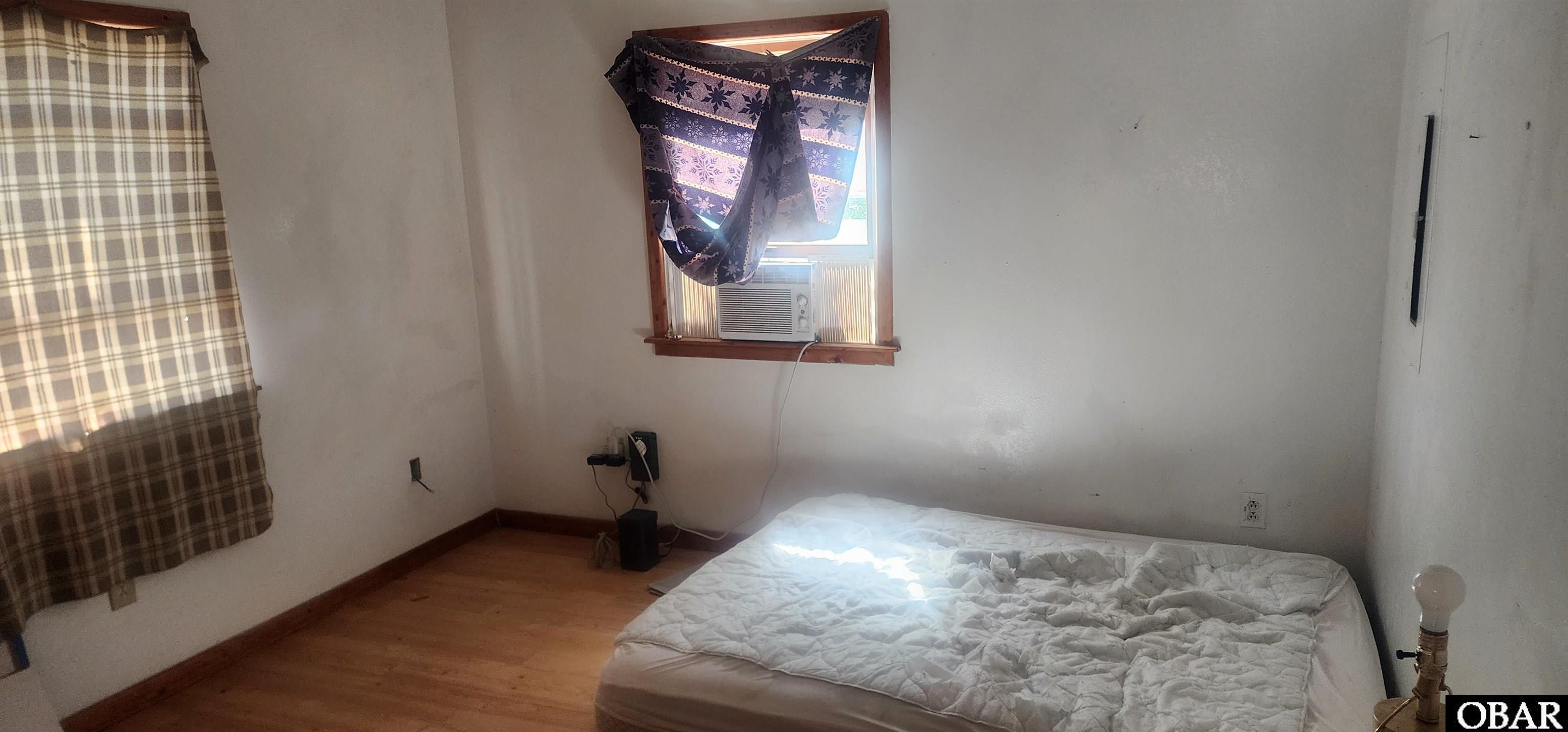 101 Inlet Court Kill Devil Hills, NC 27948 - Photo 15 of 37 Main level bedroom #1