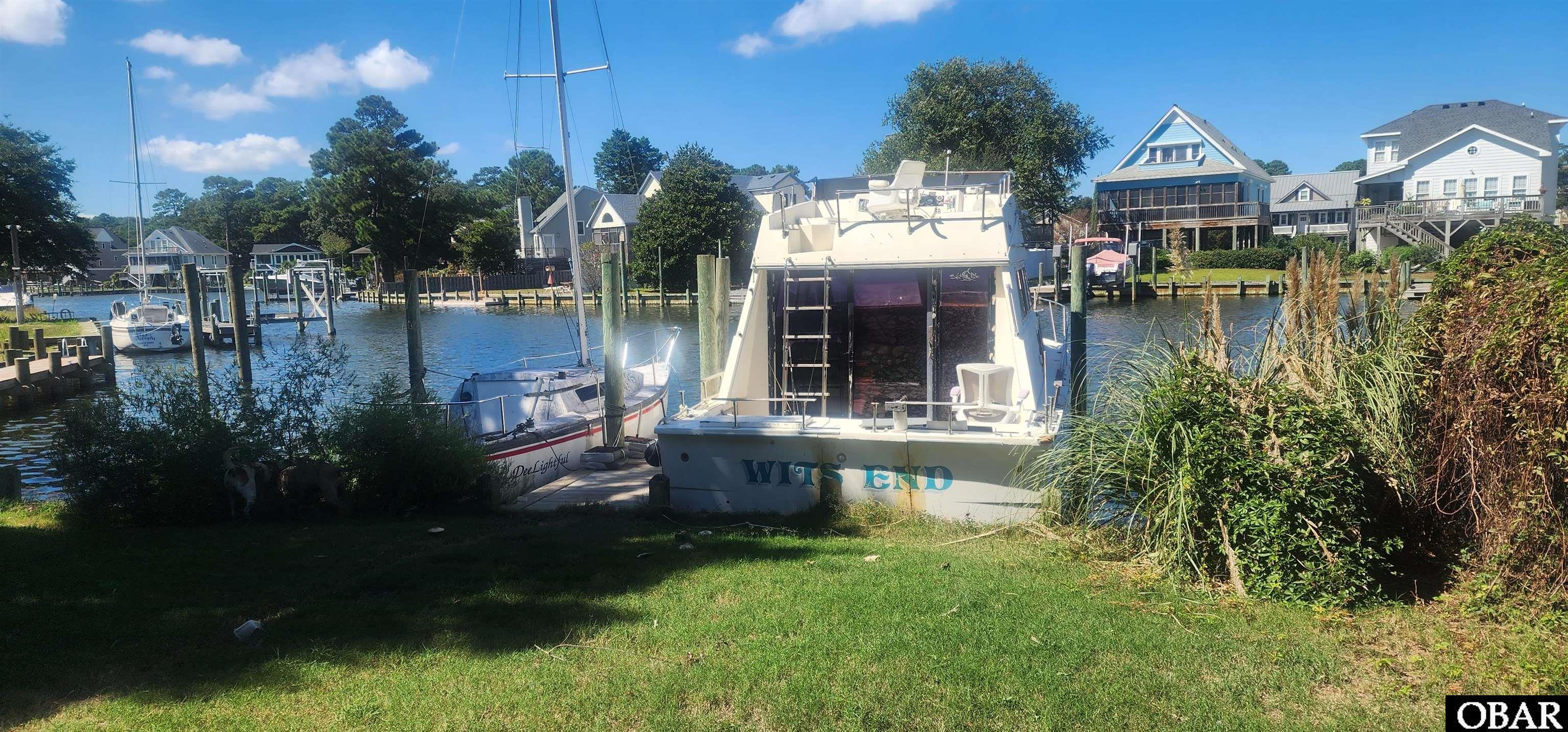 101 Inlet Court Kill Devil Hills, NC 27948 - Photo 2 of 37 Backyard and dock