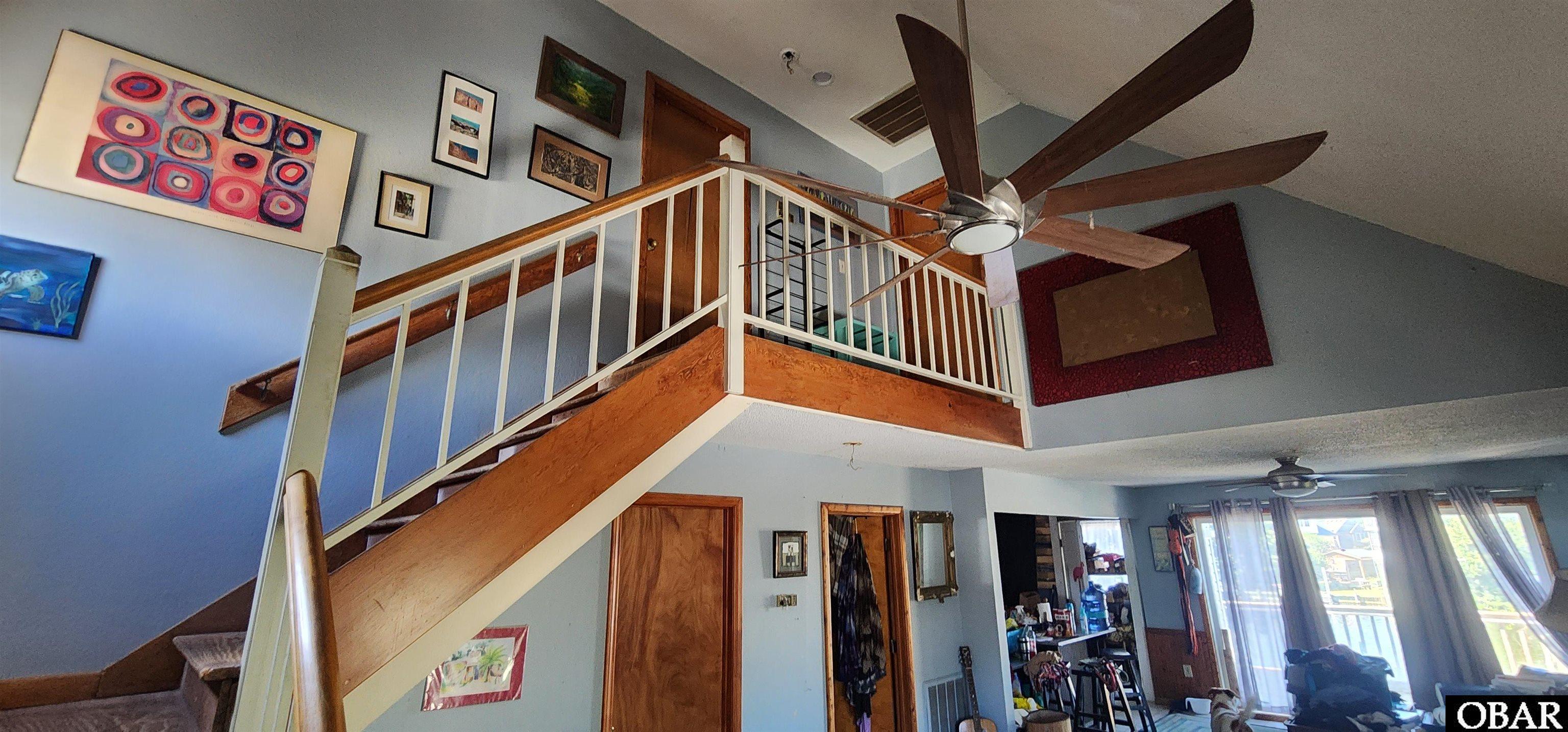 101 Inlet Court Kill Devil Hills, NC 27948 - Photo 6 of 37 Stairs to the primary and second bedroom