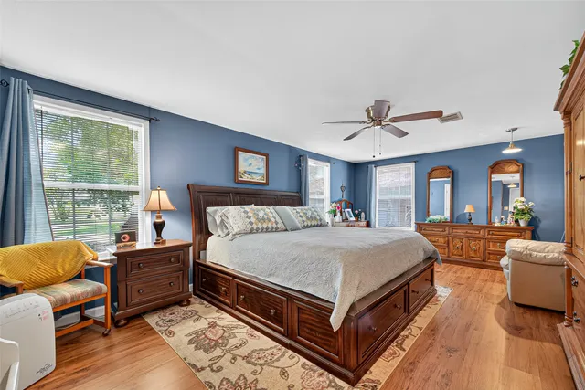 a bed room with a bed and a couch