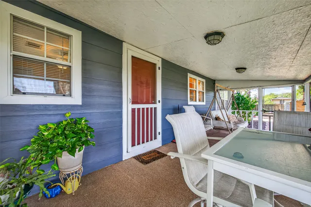 a outdoor living space with patio furniture and garden