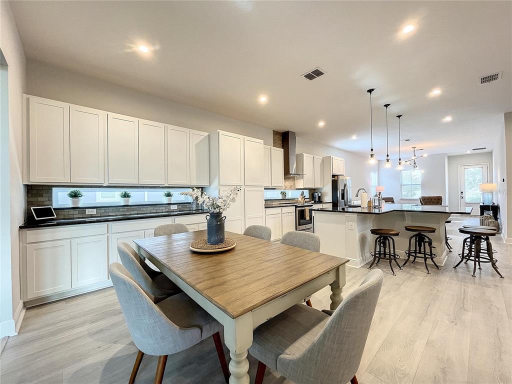 9062 Sperry Street Orlando, FL 32827 - Photo 12 of 44 a kitchen with counter space and appliances