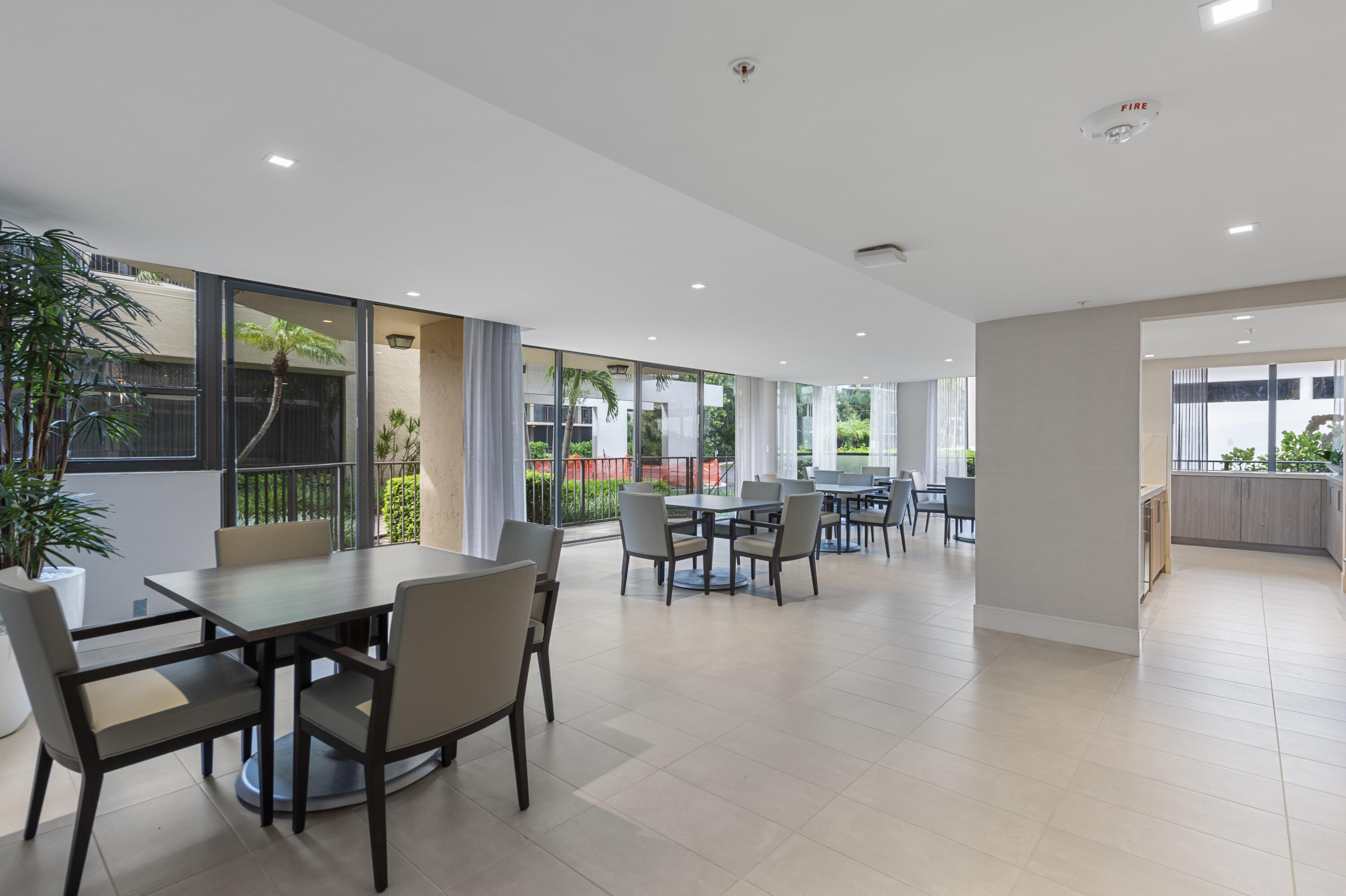 859 Jeffery Street, Unit 312 Boca Raton, FL 33487 - Photo 28 of 53 a view of a dining room with furniture window and outside view