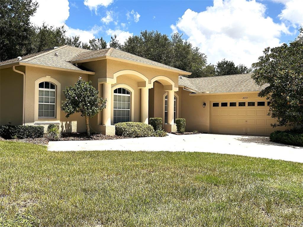 18754 Grand Club Drive Hudson, FL 34667 - Photo 1 of 37 Gallery Image 1