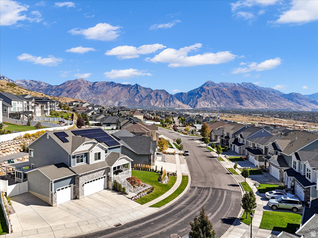 882 Spring Dew Lane Lehi, UT 84048 - Photo 3 of 46 Aerial view of residential area featuring a mountainous background