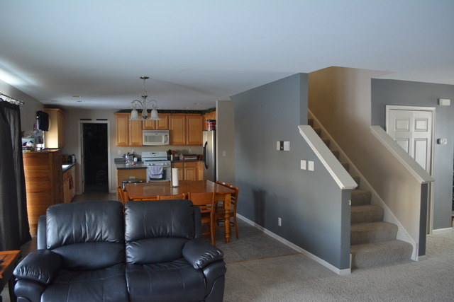 718 Wilson Street Waterman, IL 60556 - Photo 5 of 7 a living room with furniture and wooden floor