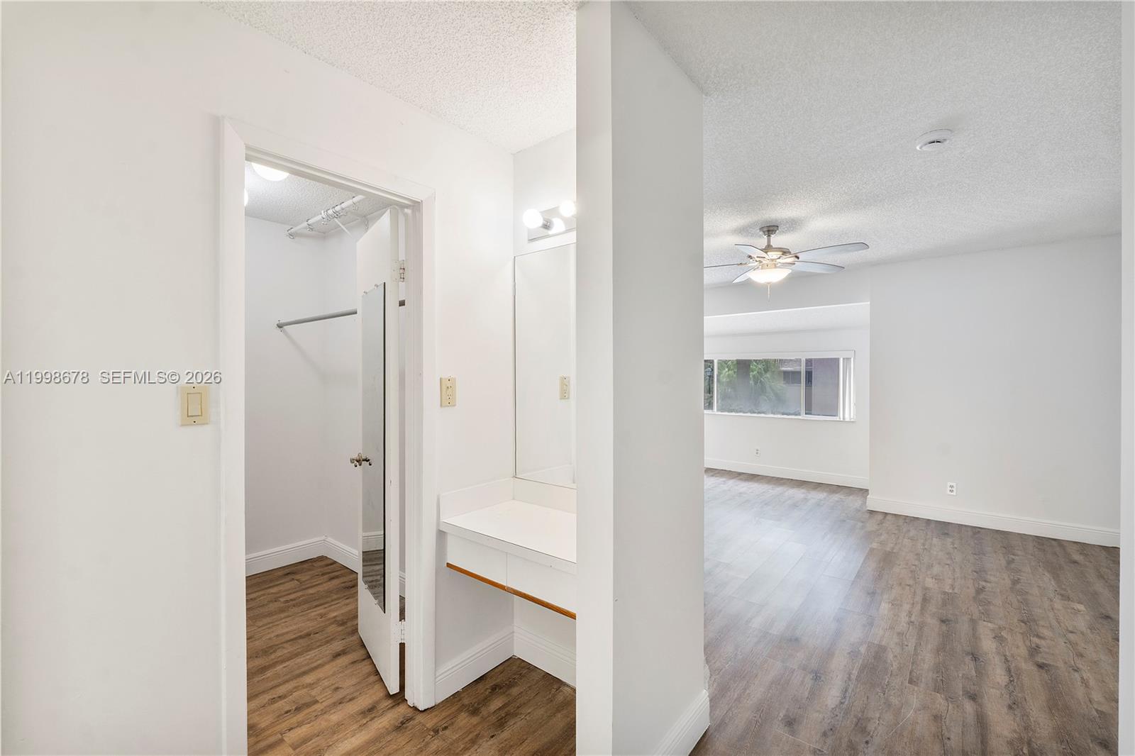 8243 Northwest 9th Street, Unit 7 Plantation, FL 33324 - Photo 17 of 30 a view of entryway with wooden floor