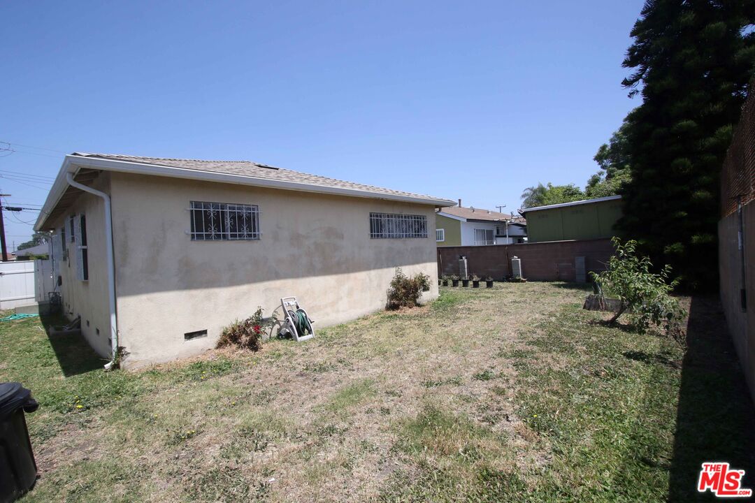 1022 West 156th Street Compton, CA 90220 - Photo 22 of 24 a view of a backyard