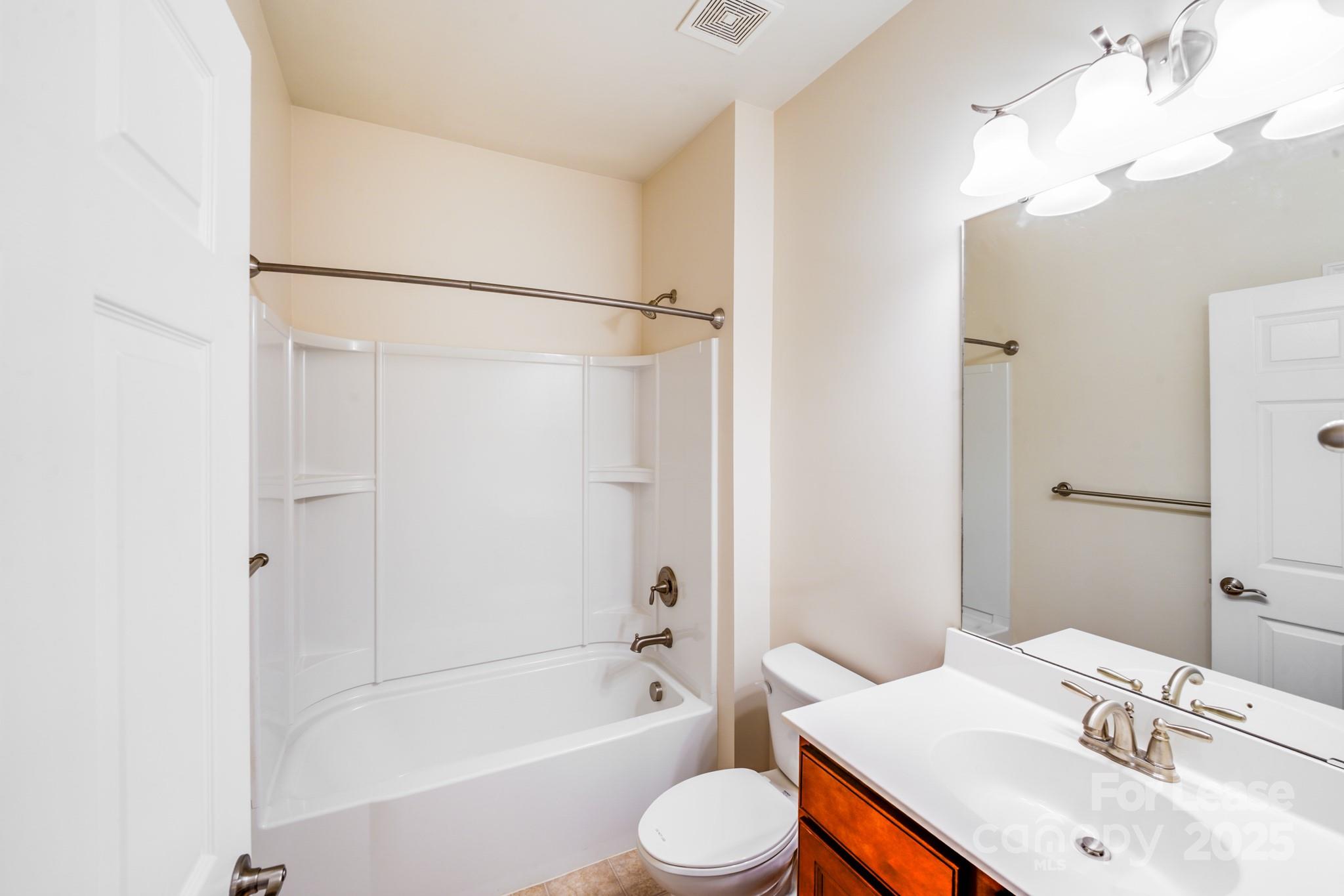 7012 Kitty Hawk Lane Fort Mill, SC 29707 - Photo 23 of 46 a bathroom with a sink toilet and shower