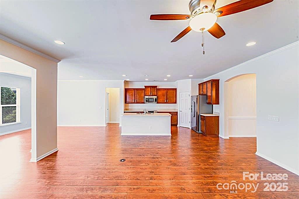 7012 Kitty Hawk Lane Fort Mill, SC 29707 - Photo 46 of 46 a view of a living room with furniture and a ceiling fan