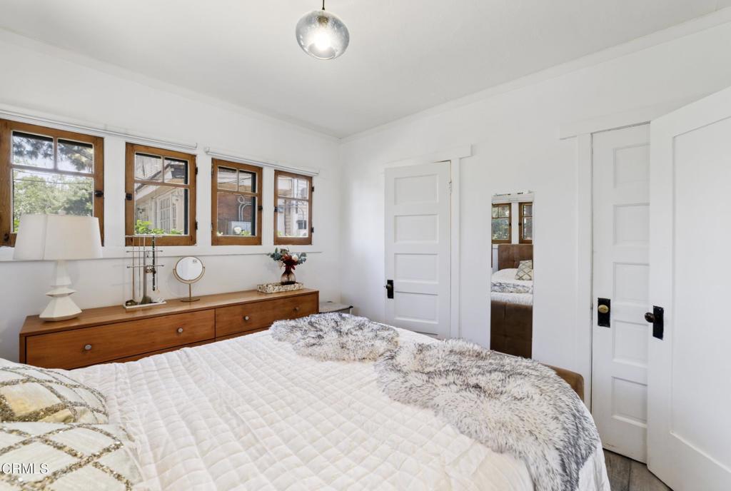 100 Palmetto Drive, Unit 2 Pasadena, CA 91105 - Photo 12 of 21 a spacious bedroom with a large bed and a sink