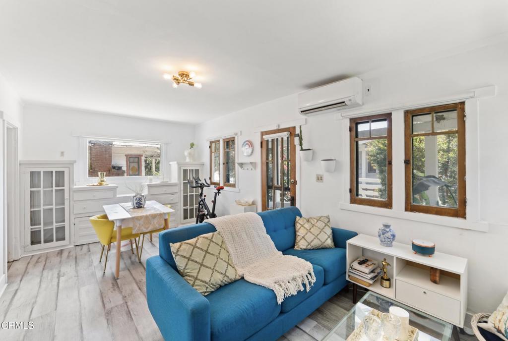 100 Palmetto Drive, Unit 2 Pasadena, CA 91105 - Photo 8 of 21 a living room with furniture and a large window