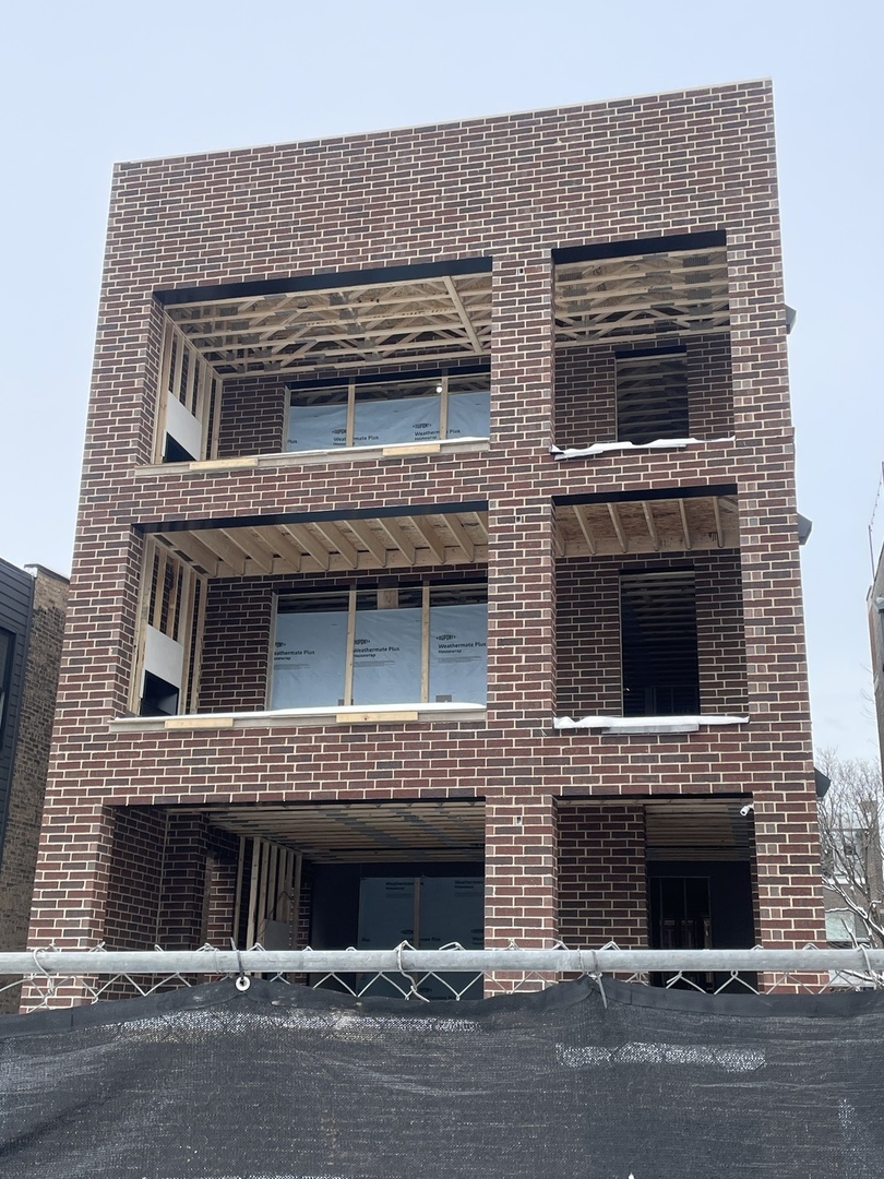 1509 West School Street, Unit 2 Chicago, IL 60657 - Photo 7 of 7 a front view of a house