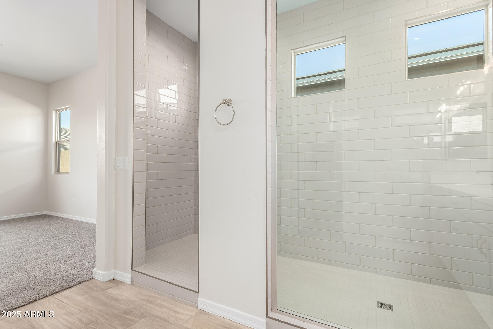 4818 West Capistrano Avenue Laveen, AZ 85339 - Photo 18 of 44 a bathroom with a shower