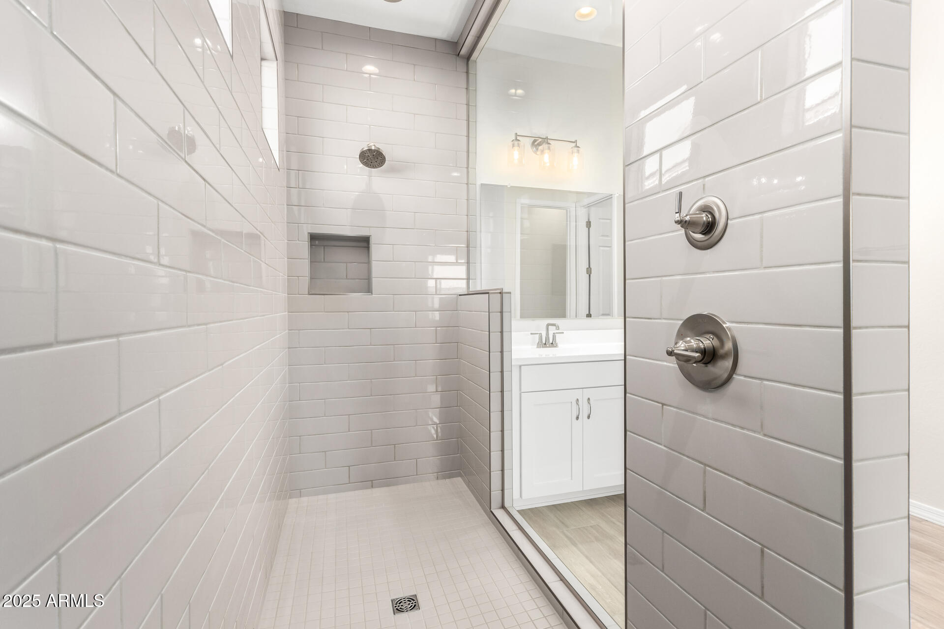 4818 West Capistrano Avenue Laveen, AZ 85339 - Photo 19 of 44 a bathroom with a shower