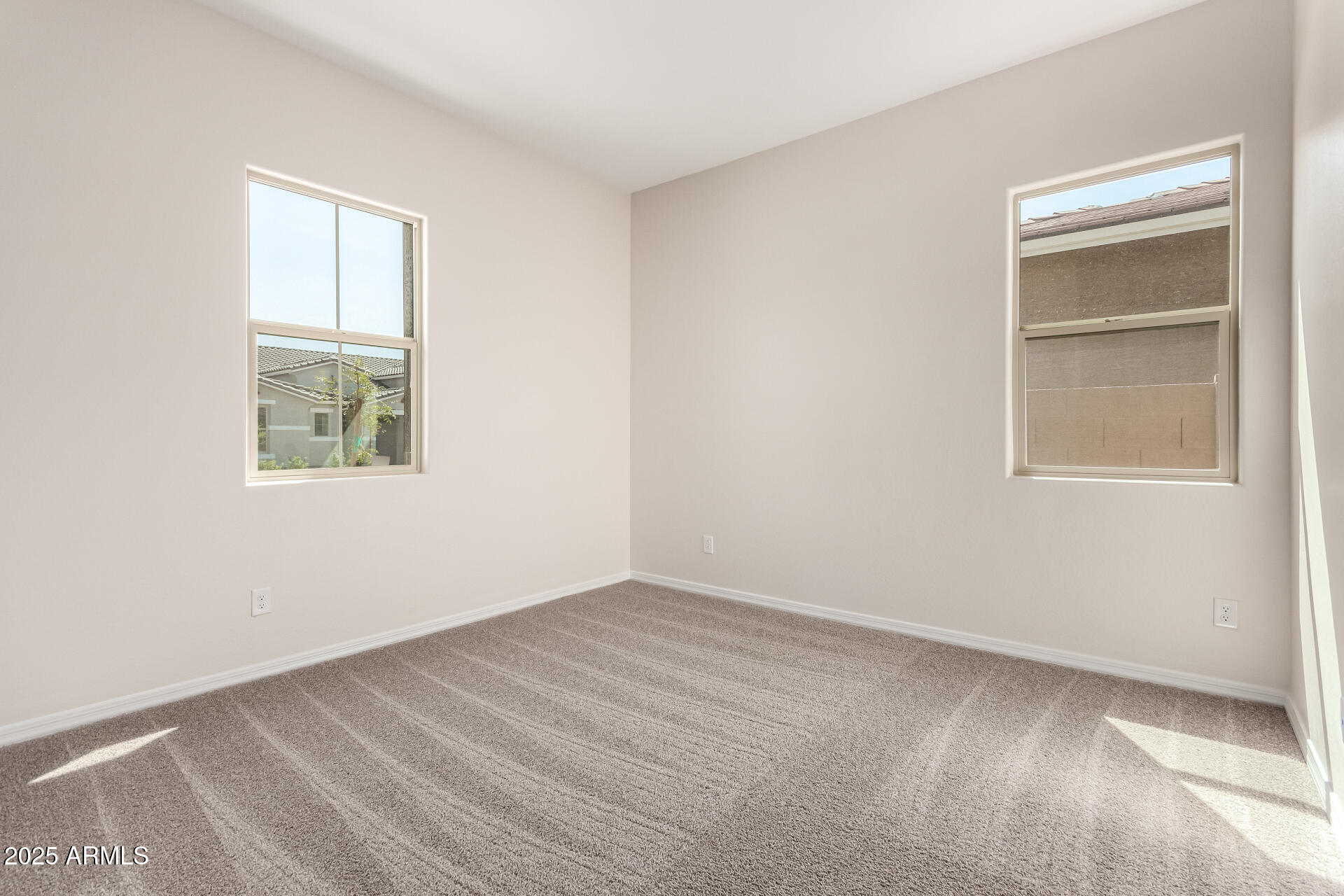 4818 West Capistrano Avenue Laveen, AZ 85339 - Photo 26 of 44 an empty room with a window