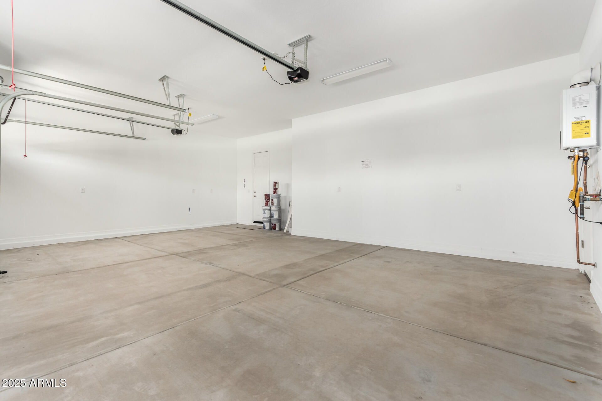 4818 West Capistrano Avenue Laveen, AZ 85339 - Photo 37 of 44 a view of a room with stairs and a ceiling fan