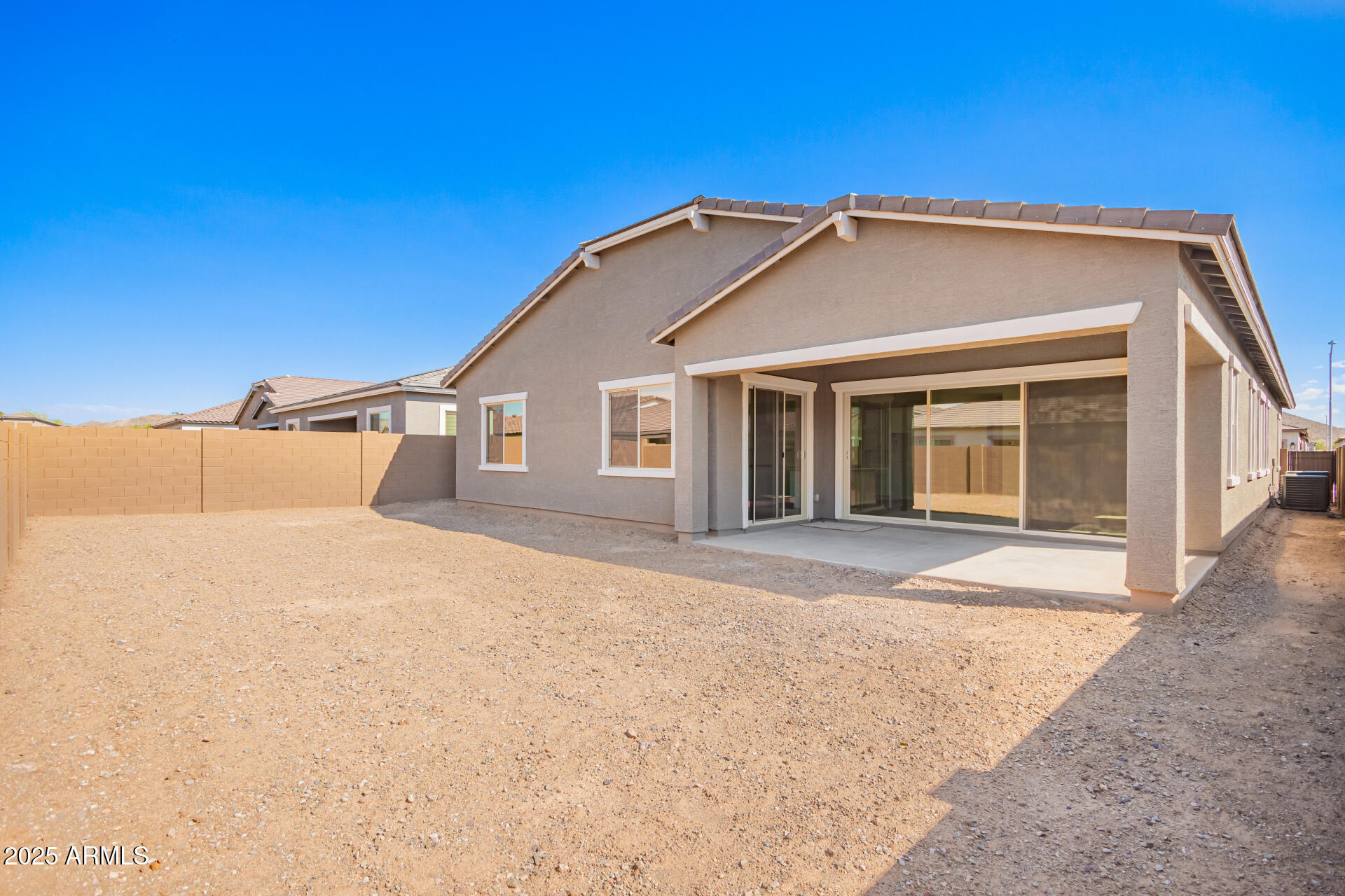 4818 West Capistrano Avenue Laveen, AZ 85339 - Photo 39 of 44 a view of a house with a outdoor space