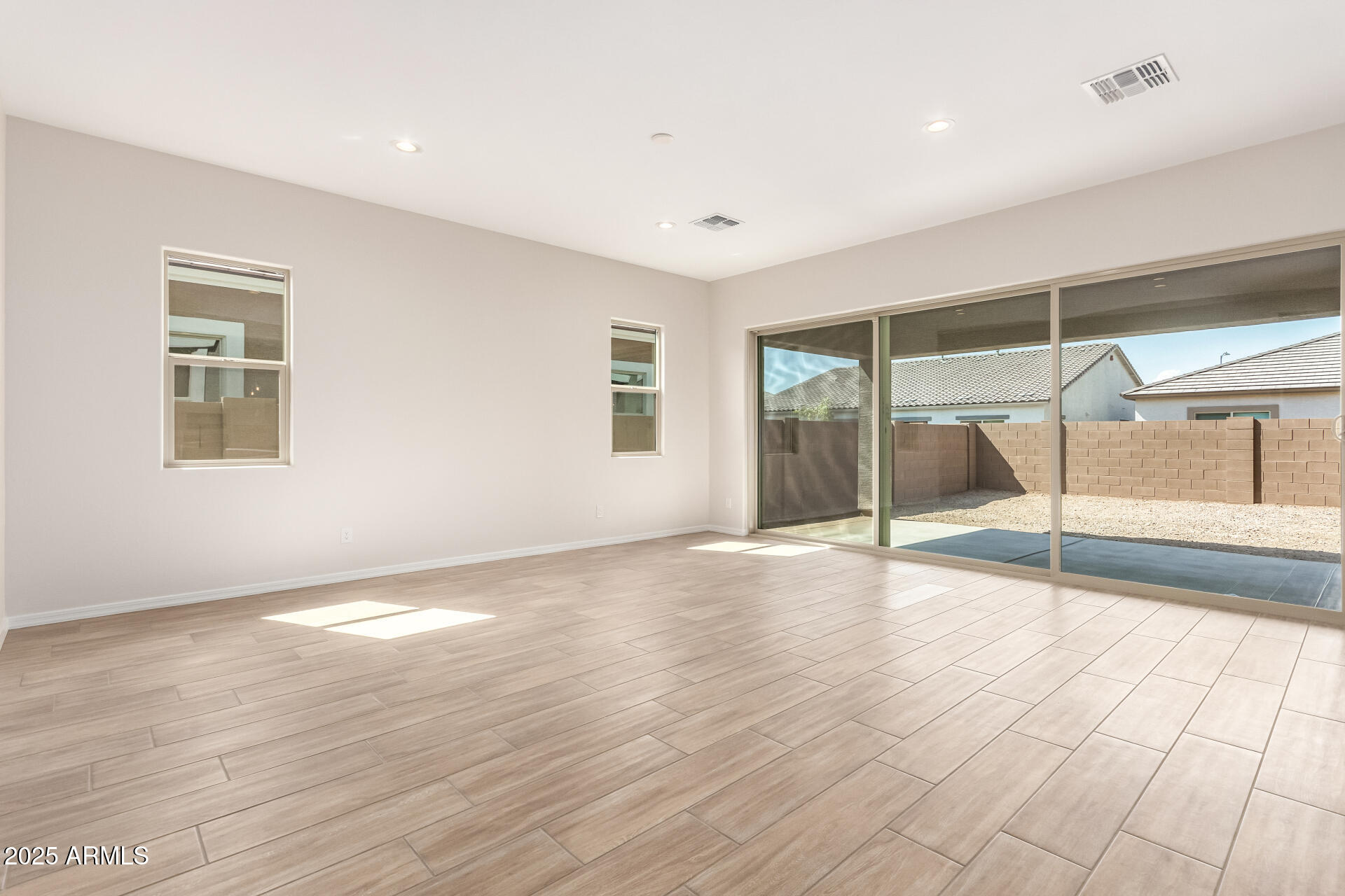 4818 West Capistrano Avenue Laveen, AZ 85339 - Photo 8 of 44 a view of an empty room with a window