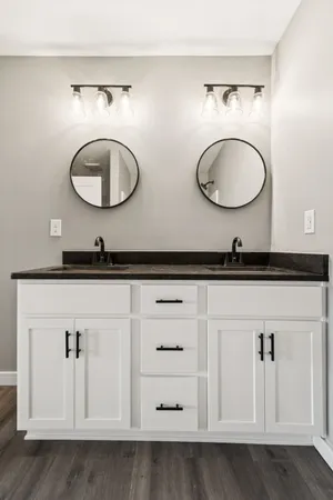 an aerial view of a mirror and vanity in a room