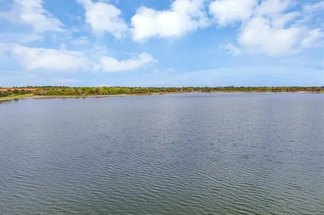 a kitchen with stainless steel appliances a refrigerator sink and cabinets