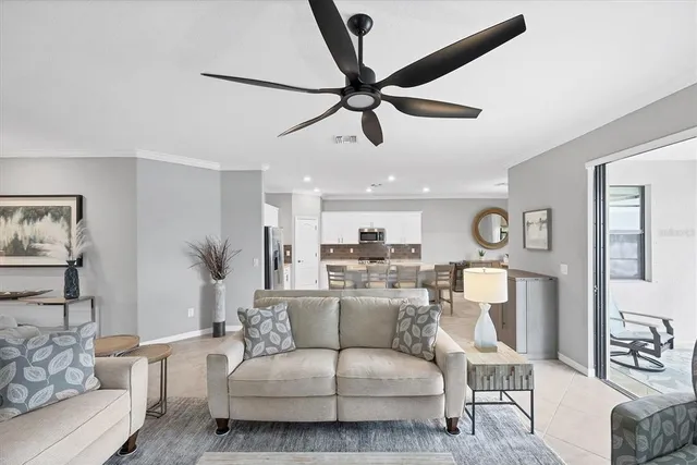 a living room with furniture and a window