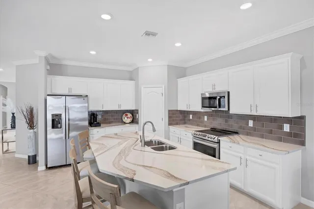 a bedroom with a bed a closet and chair