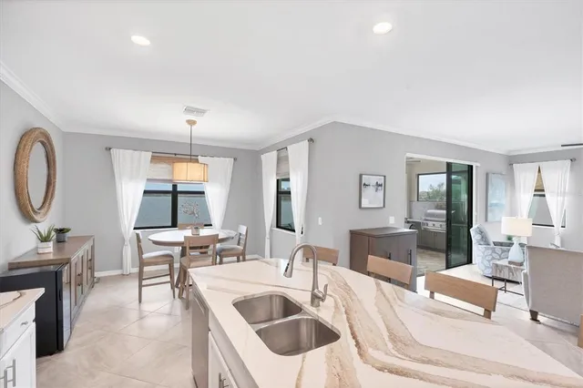 a bedroom with a large bed and a dresser