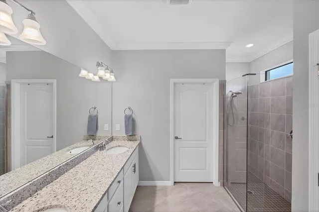 a view of a patio with couches table and chairs and potted plants