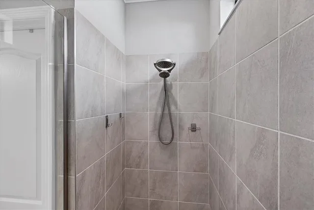 a swimming pool with outdoor seating and yard