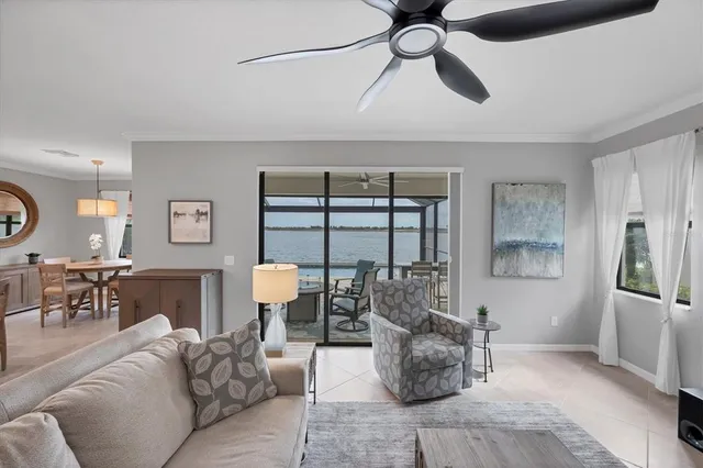 a view of a backyard with a patio and garden