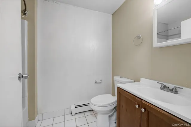 a view of a bathroom with a toilet